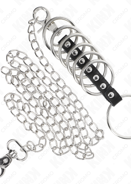 KINK - 7 ANELLI PER PENE IN METALLO DA 3,8 CM A 5 CM COLLEGATI CON PELLE E CATENA IN METALLO 100 CM